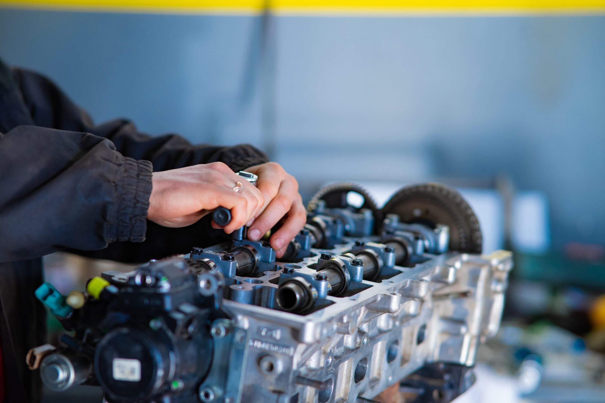 Technician working on engine repair